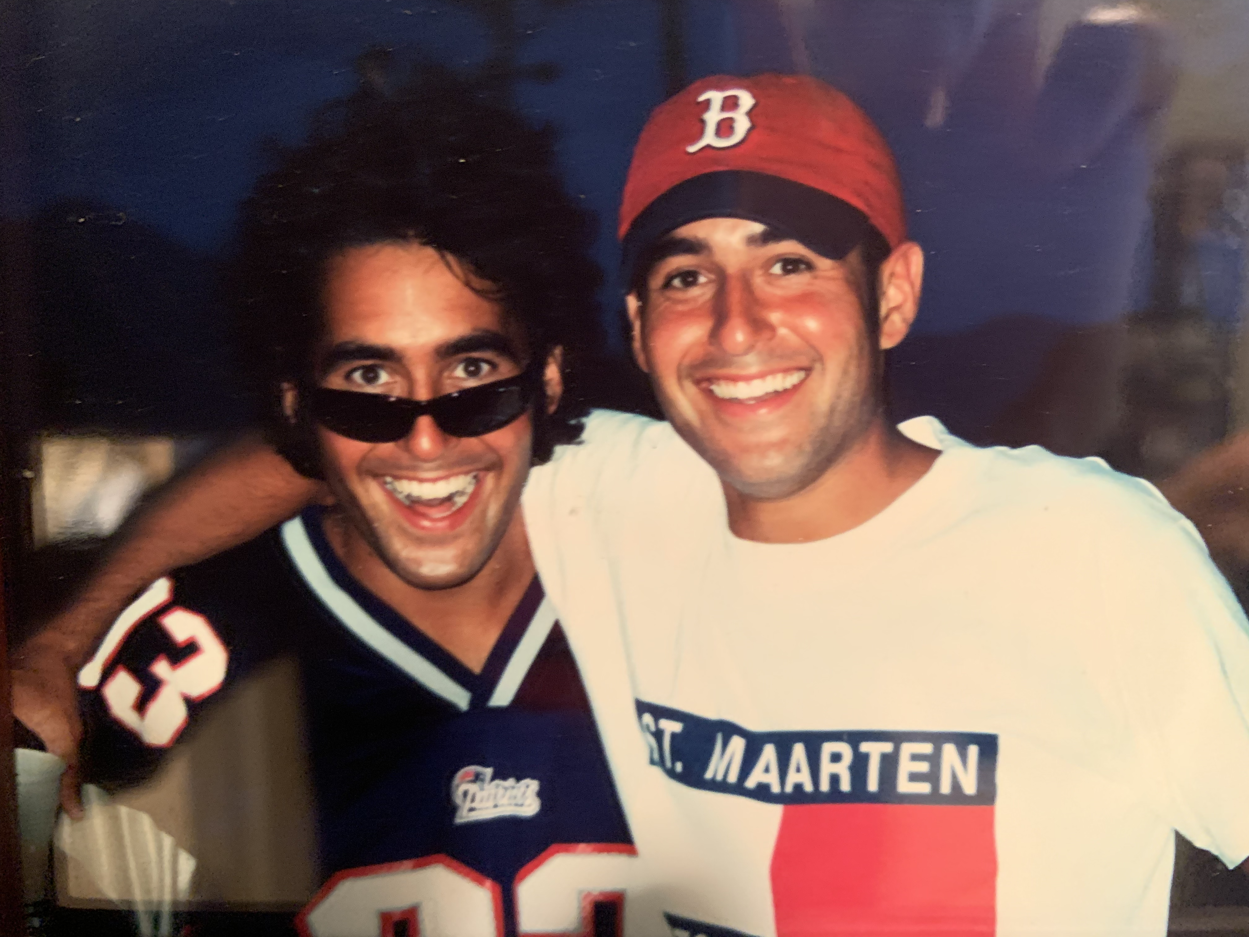 Picture of Jon Anik and Jason Anik in College on Vacation wearing Boston Sports Gear