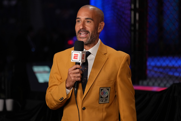 Jon Anik wears the famous ABC Worldwide Sports Yellow Jacket while hosting ESPN MMA UFC